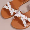 Elbise ayakkabıları yaz kadınlar beyaz düz sandalet lüks inciler gelin düğün ayakkabıları dantel çiçekler ayak bileği kayış plaj sandalet Roman terlik 231012