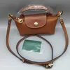 Mode av hög kvalitet väska billig handväska butik mobil äkta läder grossist svart handväska lyx crossbody 2024 mini dumpling nylon kvinnor tygväskor designer designer