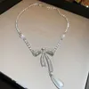 Set di orecchini con collana di perle e fiocco in zircone, leggero, lussuoso, dal design alla moda, accessori versatili per piccoli gruppi 231015