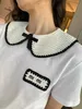 Little 2023 Summer New Front Shoulder Hand Hook Doll Flip Collar Decorative Label Short Sleeve T-shirt Female