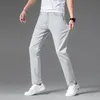 Jeans da uomo 2023 Primavera Estate Classico giovanile Vitalità Fit dritto sottile denim leggero pantaloni elasticizzati in cotone 231013