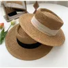 Romantyczna Lady Ribbon Słomowa słoma kapelusz Sunhat Summer Web Celebrity Top Suntan Vacation Beach Travel Skinpy Brim Hats3404