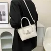 Дизайнерская французская ниша супер горячая маленькая сумка для женщин Новая высококачественная иностранная сумочка поперечного кузова в иностранном стиле.
