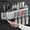 Toothbrush Holders IZEFS Wall-mounted Toothbrush Holder Storage Box Bathroom Toothpaste Squeezer Punch-free Toothbrush Holder Bathroom Accessories 231013