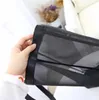 Sac de shopping en maille classique, sac de voyage à motif de luxe, sac de lavage pour femmes, étui de rangement de maquillage cosmétique, étui en maille