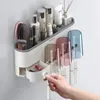 Toothbrush Holders IZEFS Wall-mounted Toothbrush Holder Storage Box Bathroom Toothpaste Squeezer Punch-free Toothbrush Holder Bathroom Accessories 231013