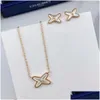 Mode Blanc Fritillaria Croix En Forme De X Pendentif Collier Pour Femmes 18K Or Rose Serrure Os Cadeau Bijoux Colliers P Dh2Yx