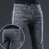 Herr jeans 2023 varumärke män smal fit mager denim designer elastiska raka stretchbyxor för 231013