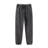 Pantaloni da jogging larghi vintage invecchiati scuri di High Street Pantaloni sportivi con coulisse Pantaloni sportivi da lavaggio da uomo