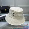 Breda randen hattar hink hattar designer stjärna samma fyra säsonger tung industri broderi fiskare hatt mäns kvinnors enkla mode personlighets pott hatt w0m8