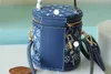 Bolsa de cubo impresa vintage de París para mujeres 15 cm * 17 cm * 15 cm 2023 New Loues Retro Classic Style Designer Bag Bolsa de cena con correa Hardware dorado YCA