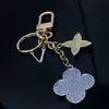 designer key chain flower stars keychains car charm fun designers keyring hundred match bag couple charm Top quality CHD2310132-6 capsboys