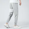 Pantaloni di cotone alla moda classici pantaloni a maglia per uomini e donne pantaloni sportivi casual a quattro barre di guardia