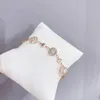 Koreaanse luxe glanzende zirkoon roségouden bloemarmband Charmante damesmodearmband voor dames Bruiloft Valentijnsdag Sieraden Cadeau Kledingaccessoires SPC