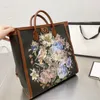 Hot designer tas Handtas handvat Tote tas Klassieke luxe leren tas Crossbody schoudertas voor heren en dames Grote capaciteit aktetas met bloemenpatroon