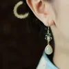 Dingle örhängen original design naturlig hetisk vit jade emalj vatten dropp kinesisk retro domstol charm kvinnor silver smycken