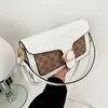 Pas cher Outlet 50% de réduction sur le sac pour femme 2023 Nouveau Tabby Wine God Une épaule Bandoulière Enveloppe de poche sous les bras imprimé Petit carré