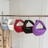 Geavanceerde handgemaakte geweven handtas voor dames nieuwe Koreaanse versie effen kleur populaire geknoopte dumplingscode Factory Online 70% verkoop