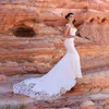 Abito da sposa Meramid Abito da sposa con applicazioni in pizzo Abito da sposa con strascico a coda di pesce su misura senza maniche 2023