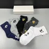 Designer Hommes Chaussettes Femmes Coton All-Match Couleur Solide Chaussettes Pantoufles Classique Crochet Cheville Respirant Noir Blanc Gris Football Basketball Sport Bas De Luxe