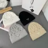 Berretti con teschio/teschio Designer Brand Cappello di moda Inverno caldo lavorato a maglia Protezione per le orecchie Casual da uomo e da donna Sci all'aperto ATIS