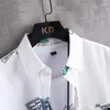 Camicie casual da uomo Camicia hawaiana da uomo con stampa geometrica Manica corta Camicetta con bottoni Top Abbigliamento ampio Camisas