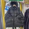 Piumino da donna Parka fuori stagione piumino da donna medio lungo con cappuccio grande sciolto coreano cappotto invernale in anatra bianca ispessita 231013