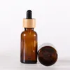 Amber Glass Droper Bottle With Bamboo Lids Essential Oils flaskor Provflaskor för parfym Kosmetiska vätskor 15 ml 20 ml 30 ml 50 ml 100 ml HBNNP