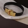 Kvinna guldspänne av hög kvalitet svart läder armband par smycken charm armband leverans203g