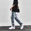 Men's Jeans High Street Vibe Men Light Blue Slim-fit Trendy Hip Hop Pants Flare Wide Leg Side Slit Buttons Male Trousers232M