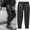 Streetwear Black Harem Jogger Pants Men Hip Hop Pockets Ribbons Drespants Męskie spodnie swobodne spodnie towarowe dla Man273y