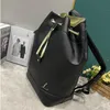 Sac à dos de luxe fourre-tout de luxe 7a qualité 2023 peau de vache grande capacité sac à dos unisexe sac de sport de plein air tirer corde voyage sac à provisions M55171 en gros