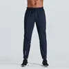 2023 Designer calças compridas homens esporte correndo alinhar yoga ao ar livre ginásio bolsos slim fit sweatpants pant jogger calças mens casual elástico iswr