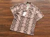 T-shirt da uomo 23SS Fasion Summer Casual Spot Stampa completa Wacko Maria Camicia Uomo Donna Hawaii Beach Tasca con risvolto Techwear