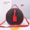 Designer de luxe Boite Chapeau Sac rond en cuir PU Sacs à bandoulière Nano Sacs à main Embrayages Femmes Téléphone Caméra Sacs à main Sac de maquillage dhgate