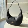 Ny gammal blomma Lockstitch Cowhide Bailey Hobo Half Moon Underarm Bag Handheld Woven Shoulder Strap Crescent Model 5598