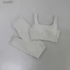 Set attivi Set da yoga a costine senza cuciture Set da allenamento per donna 5 pezzi Tute da palestra Canotta corta Pantaloncini a vita alta Completi Fitness CorsaL231014