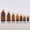 Amber Glass Droper Bottle With Bamboo Lids Essential Oils flaskor Provflaskor för parfym Kosmetiska vätskor 15 ml 20 ml 30 ml 50 ml 100 ml HBNNP