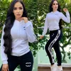 2023 Sporty Two Piece Pants Tracksuit Women Casual Print Jacket och Sweatpants sätter gratis fartyg