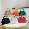 High grade feeling small bag for women's 2023 new summer trend fashion niche solid color portable one shoulder cross body shell number 7452