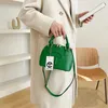 La popolare borsa piccola di quest'anno da parte del pubblico femminile è la nuova moda versatile shell portatile estiva9836