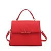 Nummer 5821 liten väska mode populärt brev fyrkantig ny kvinnors handväska en axel