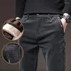 Męskie spodnie Wysokiej jakości zimowe polarowe ciepłe sztrukoi mężczyźni grube swobodne moda biznesowa rozciąganie aksamitne czarne szare zielone spodnie