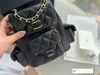 Designer Bag Flip Cowhide med diamantkedjan ryggsäck Makeup Mini axel mode kvinnor handväska mobiltelefon väska trevlig cc