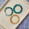 Urok Bracelets Ekologiczne palec owinięte miękki stopniowy kolor zielone mleko bodhi root 14 mm okrągły wen wen gra dłoni koraliki Buddha dla mężczyzn i