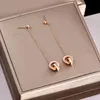 Pendientes de diamantes de cristal Encanto Oro Titanio Acero Doble anillo Herida Borla romana Números Pendientes para mujer Regalo Joya265m