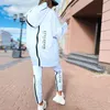 Dwuczęściowe spodnie kobiet Winter 2023 Ogabrywa stroju śladowe z kapturem Long Hoodie Set Street Sportswear Pullover Hip-Hop Dwuczęściowe kobiety