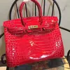 Borsa a tracolla realizzata in pelle di coccodrillo elegante semplice versatile e alla moda SFDEHF