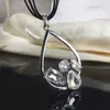 Anhänger Halsketten Luxus Mode Kristall Strass Punk Stil Metall Polierte Textur Tropfenförmige Neutrale Halskette Dekorativer Schmuck