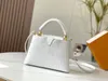 2023 nova mini bolsa de alta qualidade clássico outubro couro macio estilo rua moda designer elegante moda clássico couro crossbody saco m59440